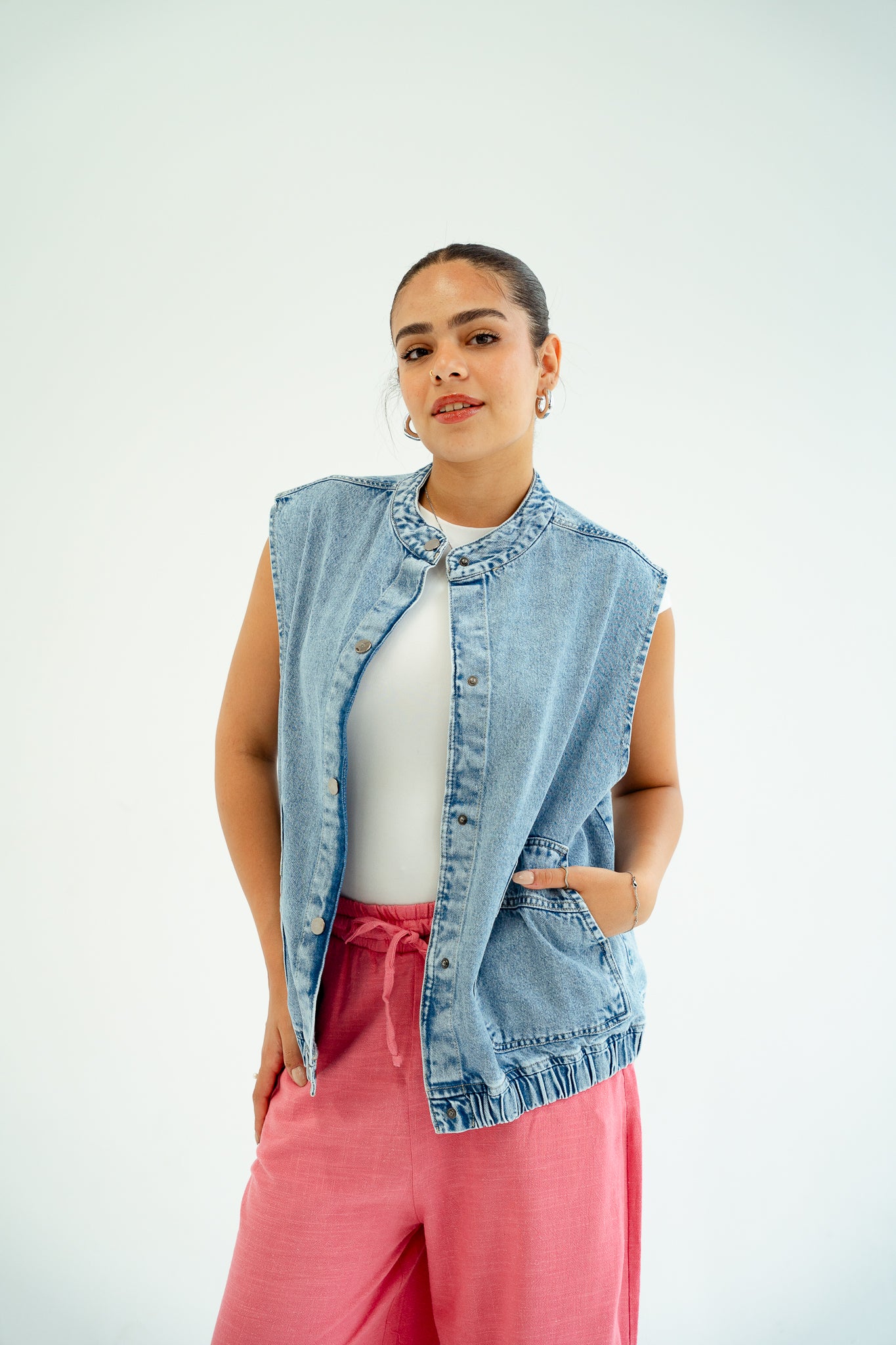 She wears Denim vest