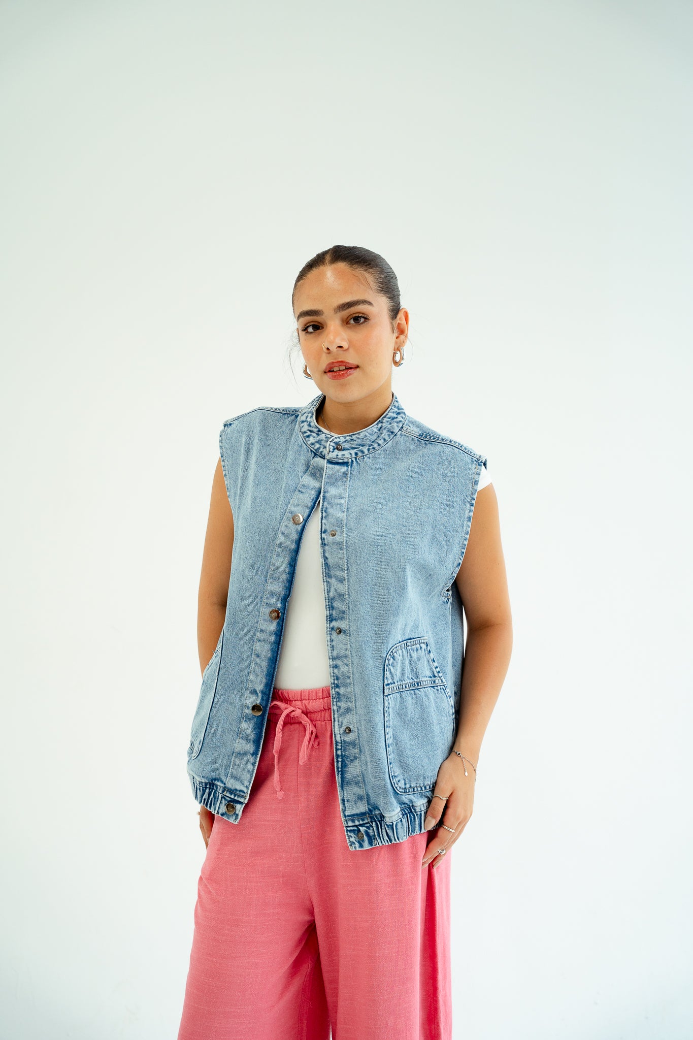 She wears Denim vest